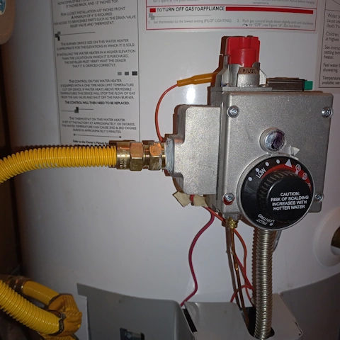 A propane gas connection to a water heater. Credit: Paul Racko