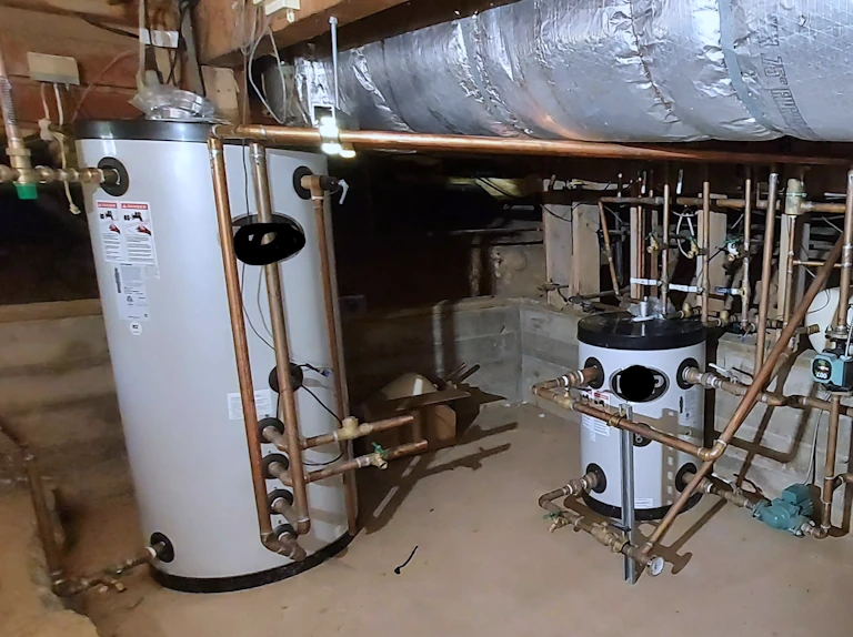 A water heater installation in a basement.